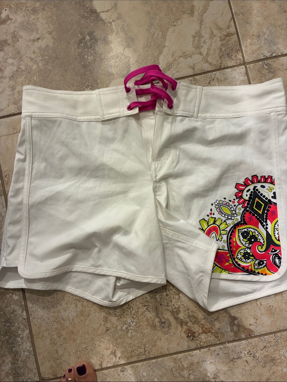 Athleta White Swim Shorts with Pink Lace-Up and Colorful Paisley Accent